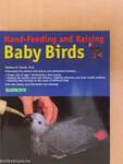 Hand-feeding and raising baby birds