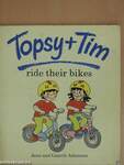 Topsy + Tim ride their bikes