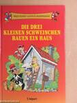 Die drei kleinen Schweinchen bauen ein Haus