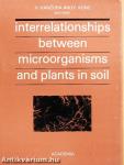 Interrelationships between microorganisms and plants in soil