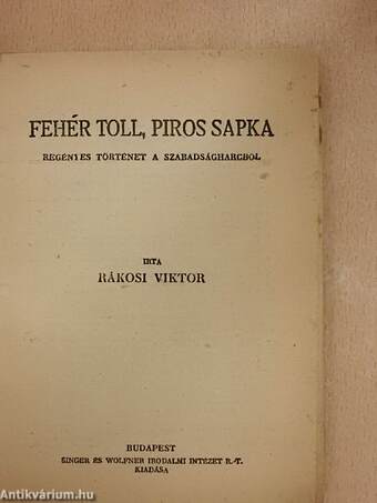 Fehér toll, piros sapka