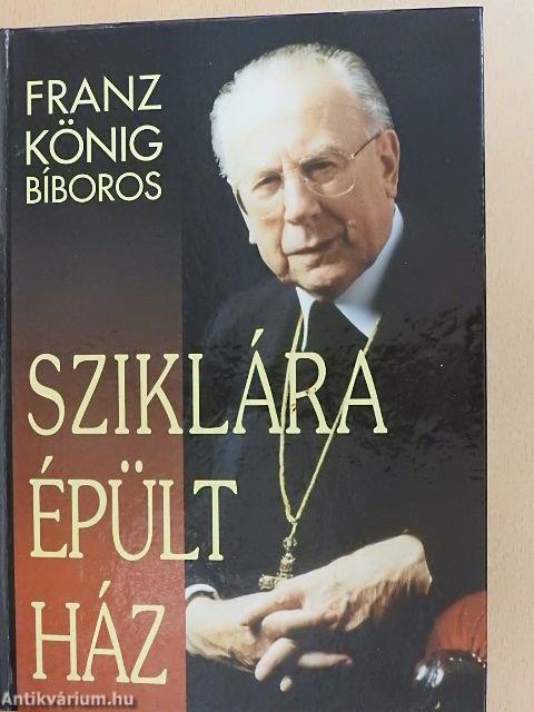 Sziklára épült ház