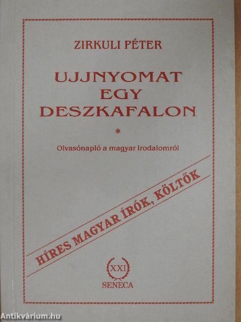 Ujjnyomat egy deszkafalon