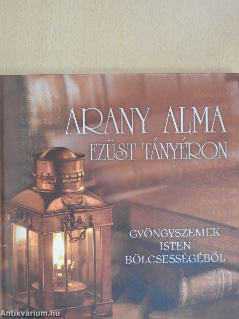 Arany alma ezüst tányéron