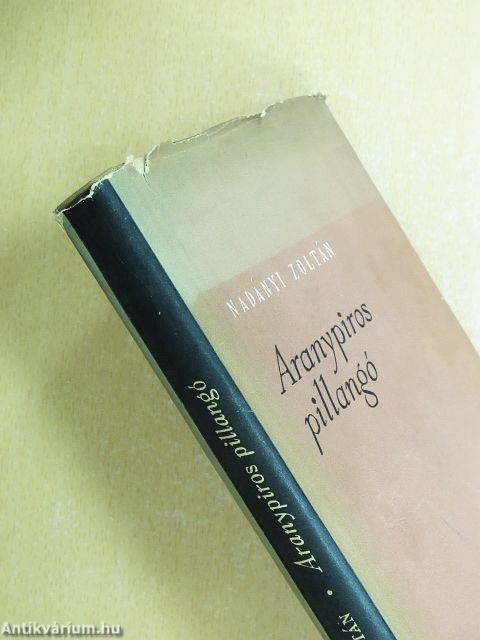 Aranypiros pillangó