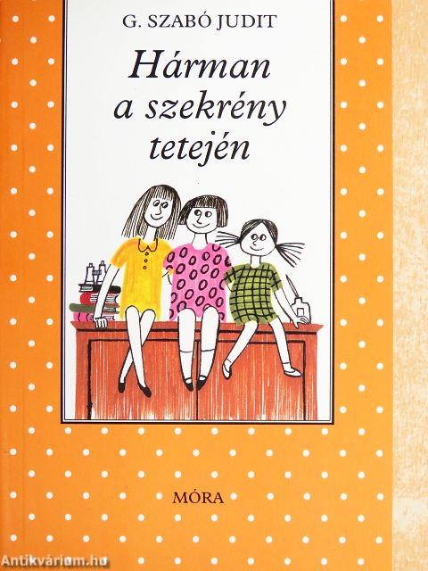 Hárman a szekrény tetején