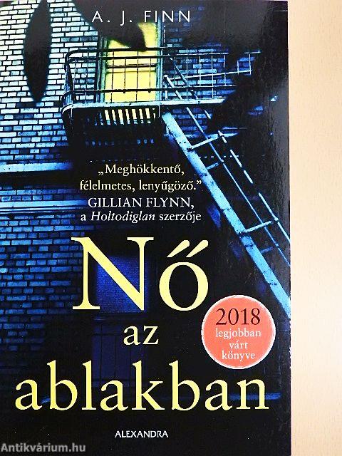 Nő az ablakban