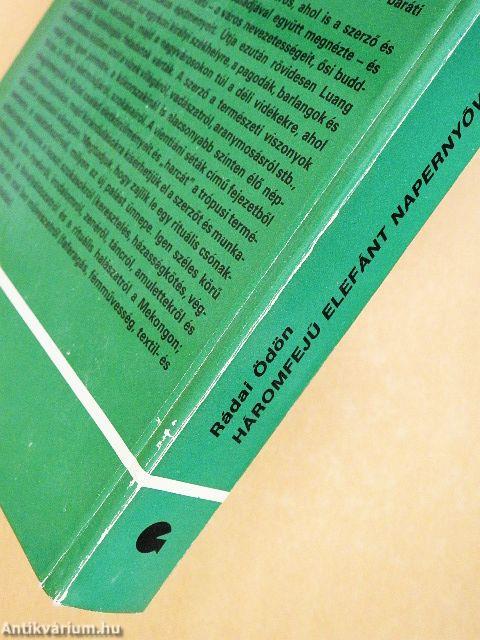 Háromfejű elefánt napernyővel