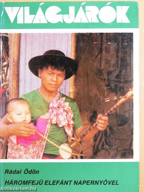 Háromfejű elefánt napernyővel