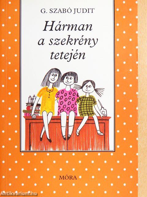 Hárman a szekrény tetején