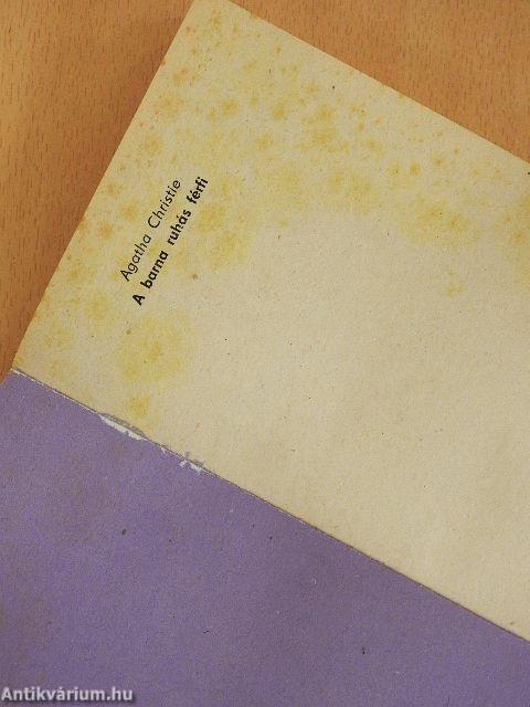 A barna ruhás férfi